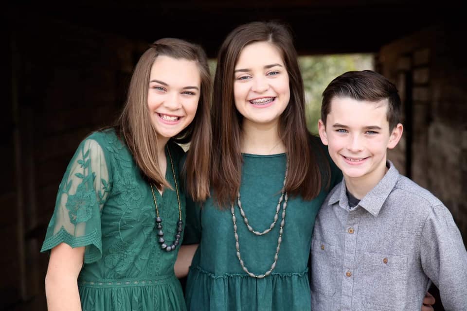 Sporting their favorite paper bead!